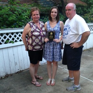 Kerri Roach with her parents, Maureen and Bob Roach